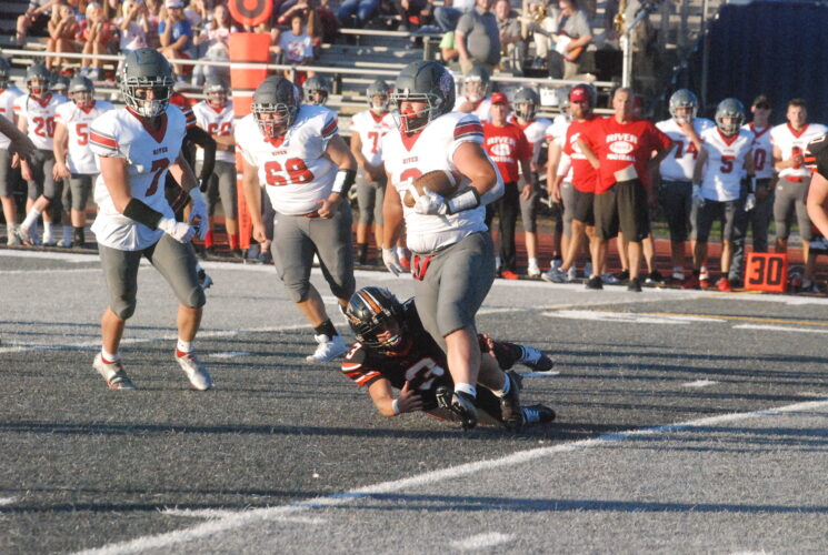 Isaly Leads Pilots Past Marietta 52-22
